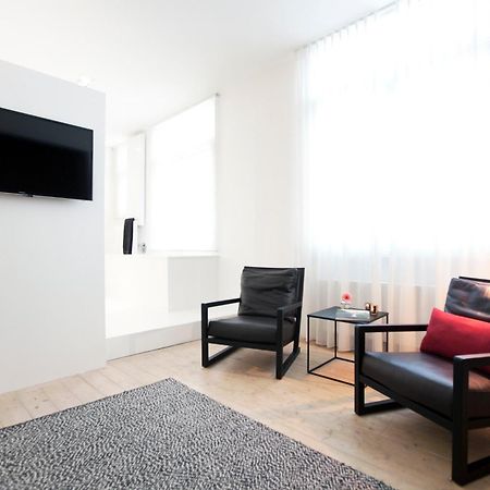 Maison Nationale City Flats & Suites Amberes Habitación foto A room at the hotel