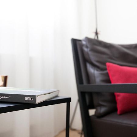 Maison Nationale City Flats & Suites Amberes Habitación foto The interior of the hotel