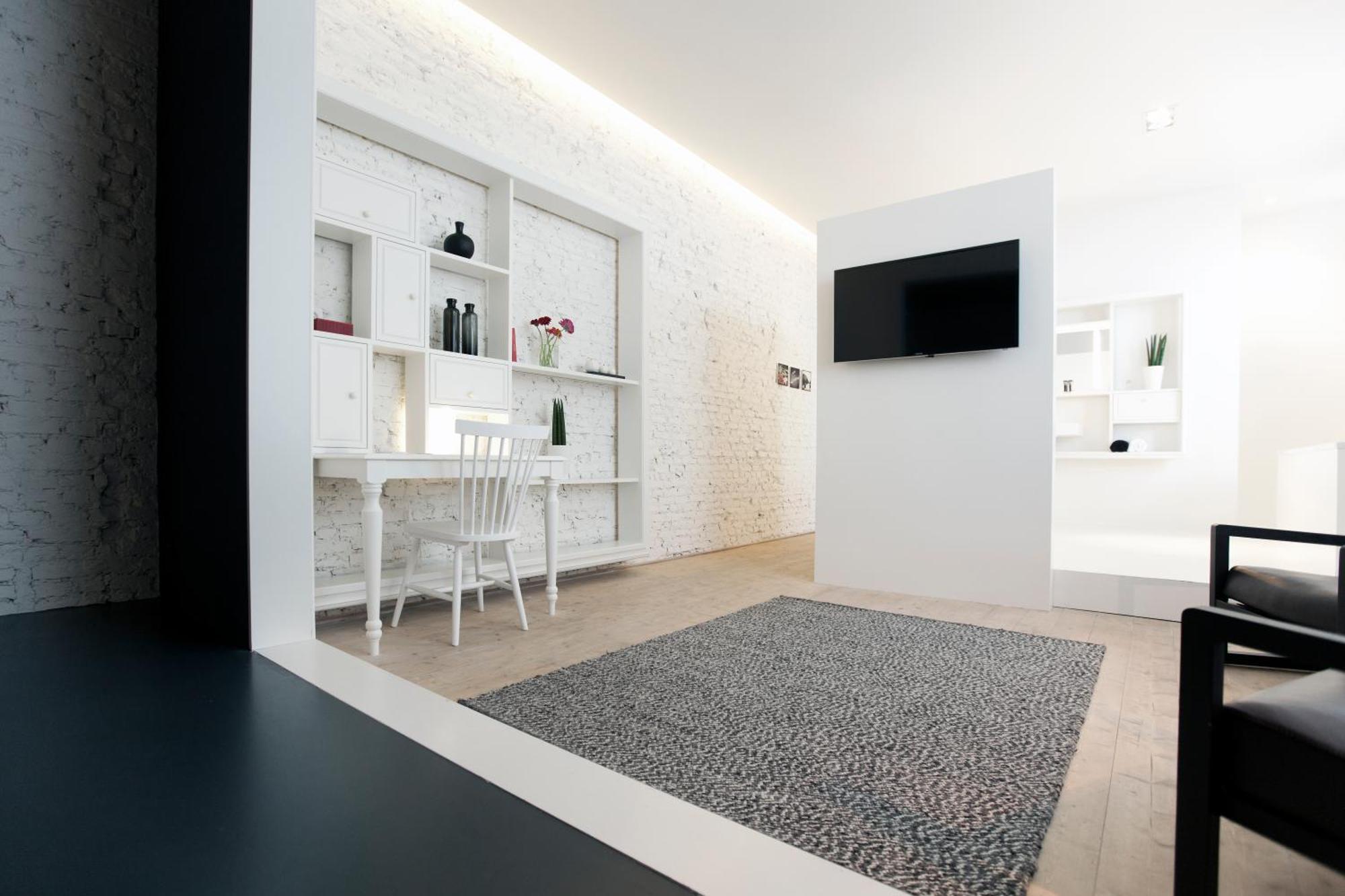 Maison Nationale City Flats & Suites Amberes Habitación foto A carpet