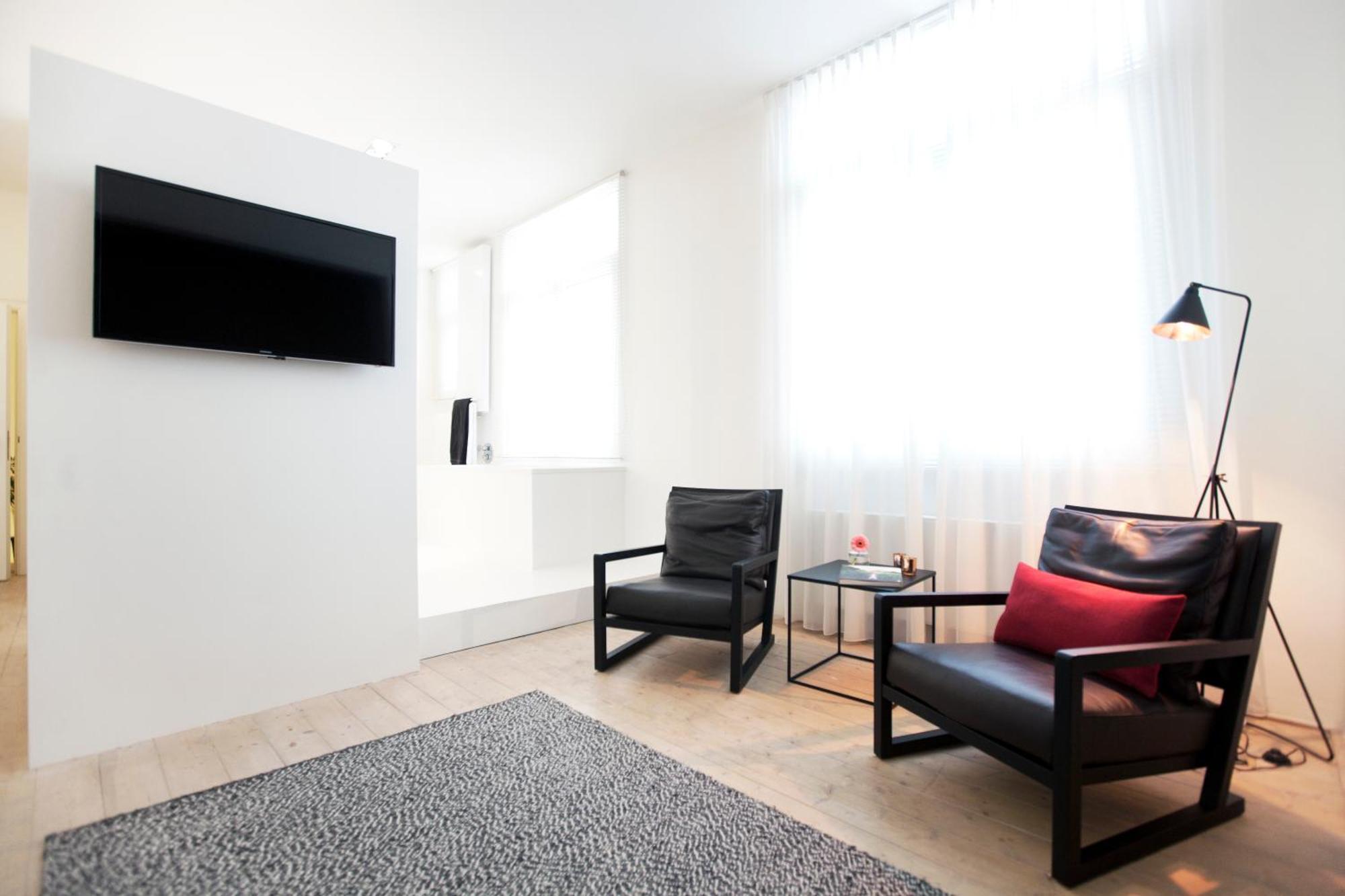 Maison Nationale City Flats & Suites Amberes Habitación foto A room at the hotel