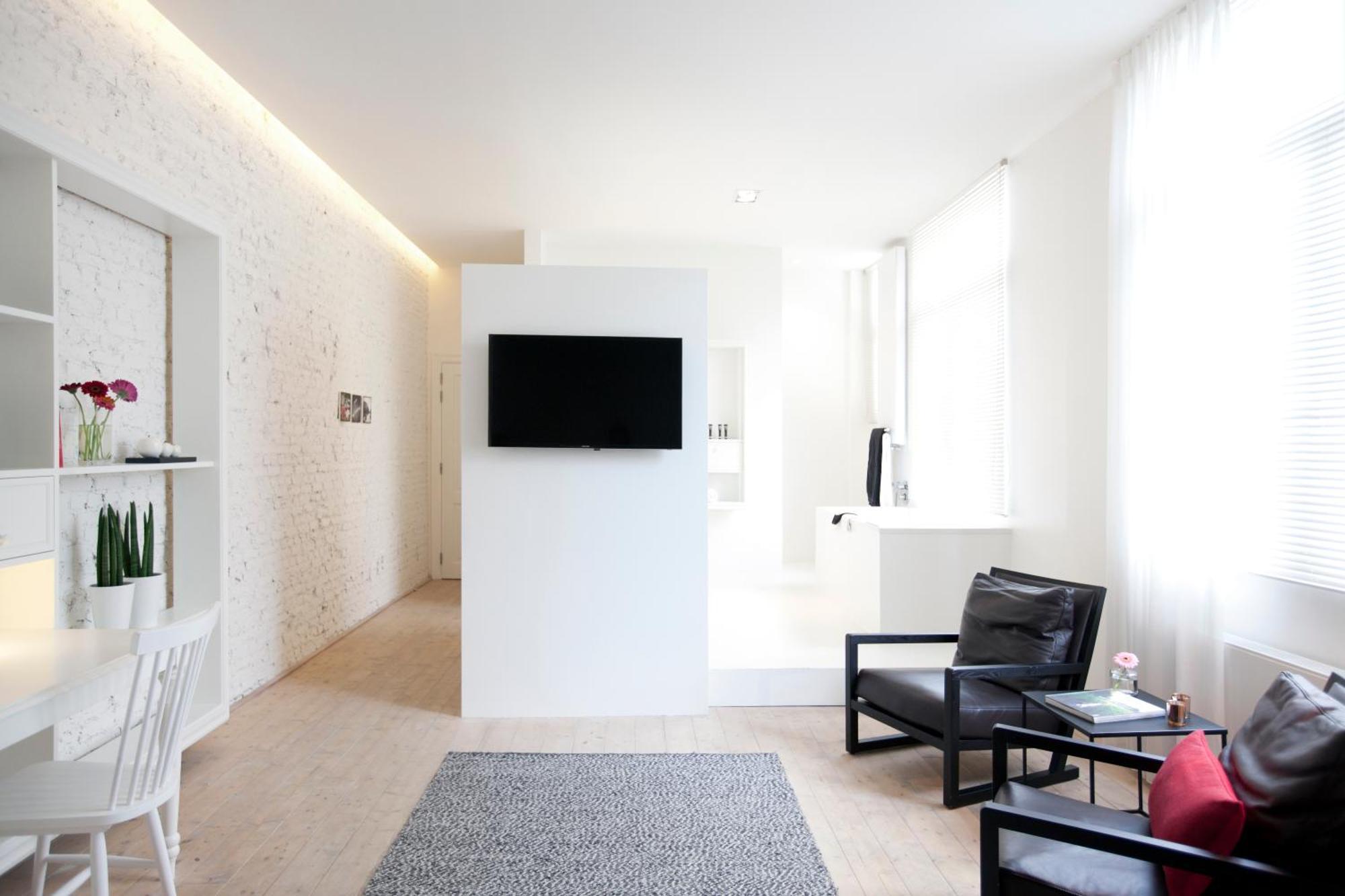 Maison Nationale City Flats & Suites Amberes Habitación foto A room at the hotel