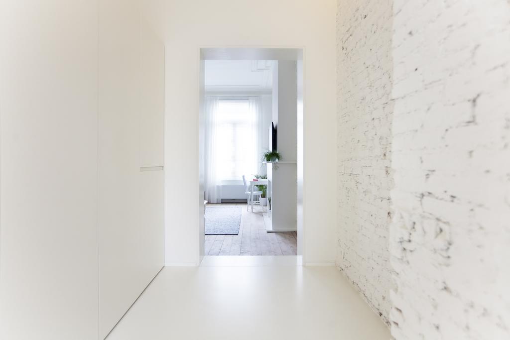 Maison Nationale City Flats & Suites Amberes Habitación foto Interior of the house