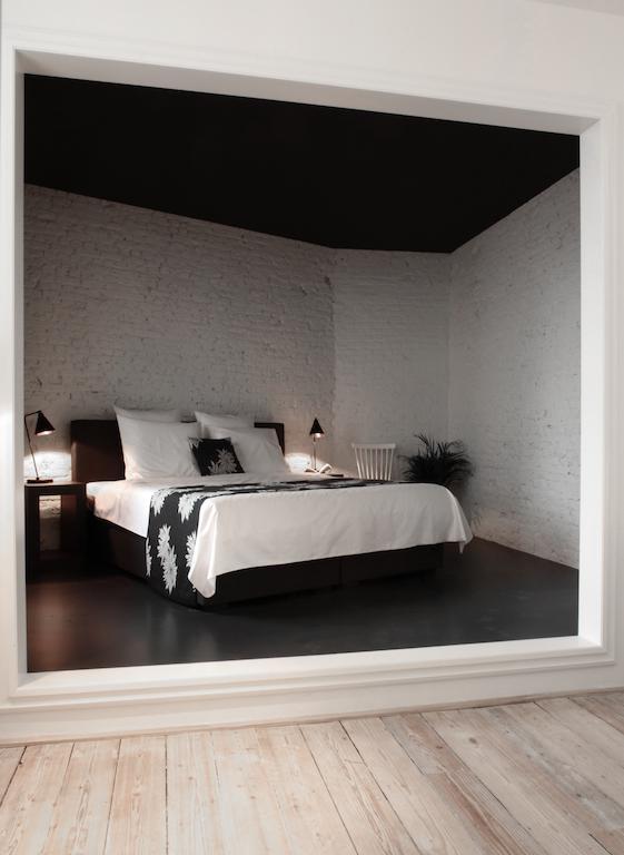 Maison Nationale City Flats & Suites Amberes Habitación foto A bedroom