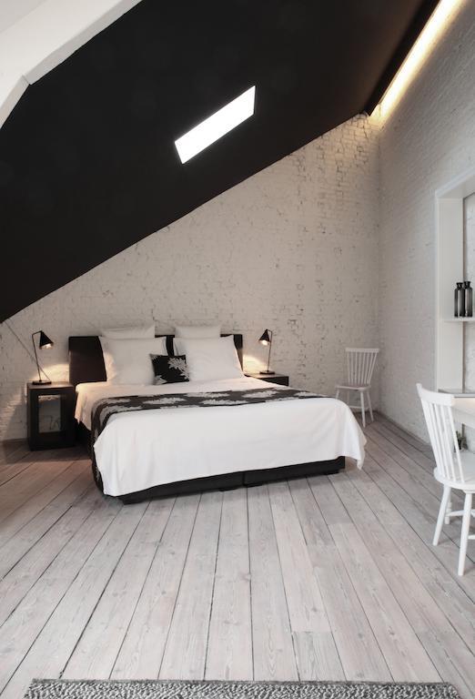 Maison Nationale City Flats & Suites Amberes Exterior foto A room at the hotel