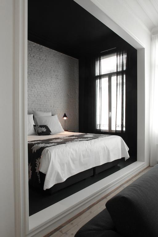 Maison Nationale City Flats & Suites Amberes Exterior foto A room at the hotel