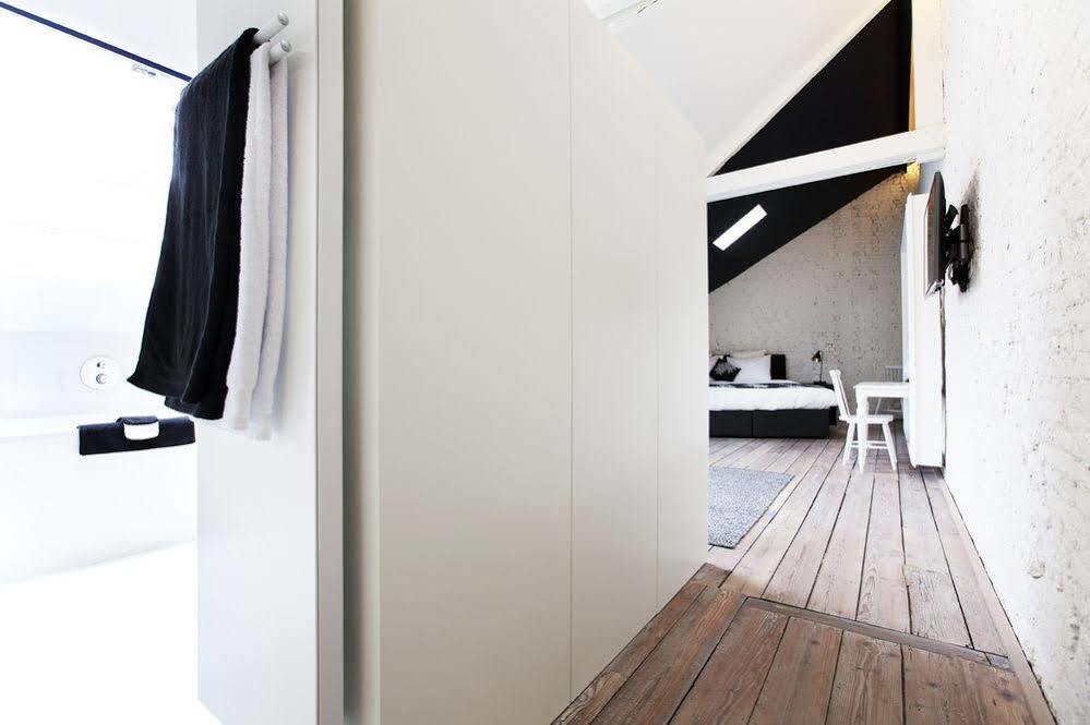 Maison Nationale City Flats & Suites Amberes Exterior foto A bathroom in the hotel